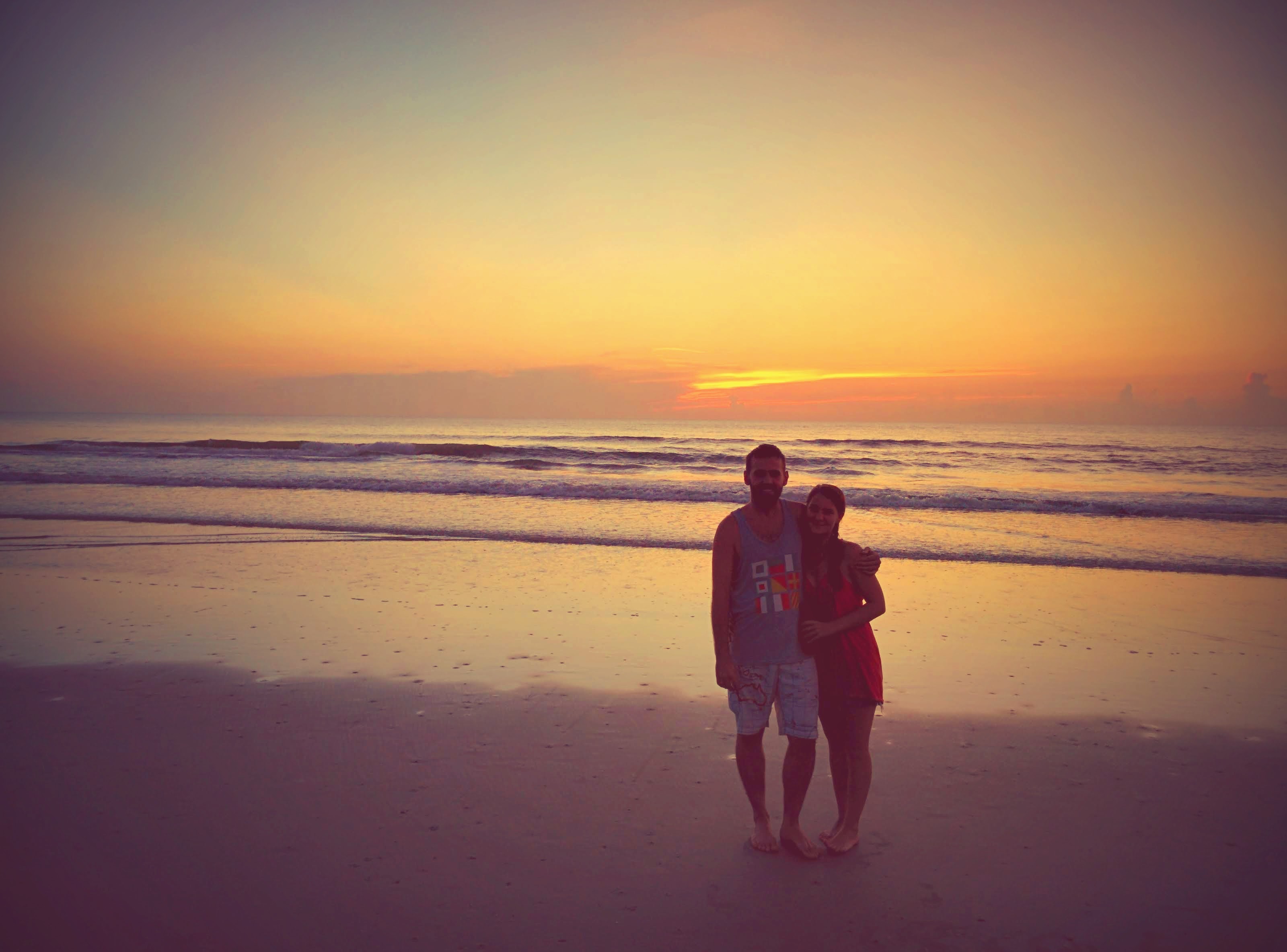 Couple on the beach at sunset